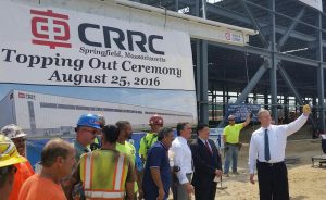 Baker at CRRC with ironworkers in August. (via wamc.org)